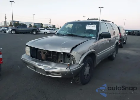 1999 GMC Jimmy Sle z USA, uszkodzony, nr VIN 1GKCS13W3X2507684